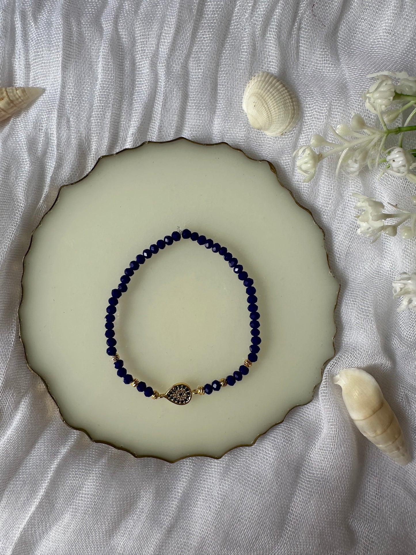 Perlenarmband mit Dunkelblauen Kristallperlen und Nazar - 10255