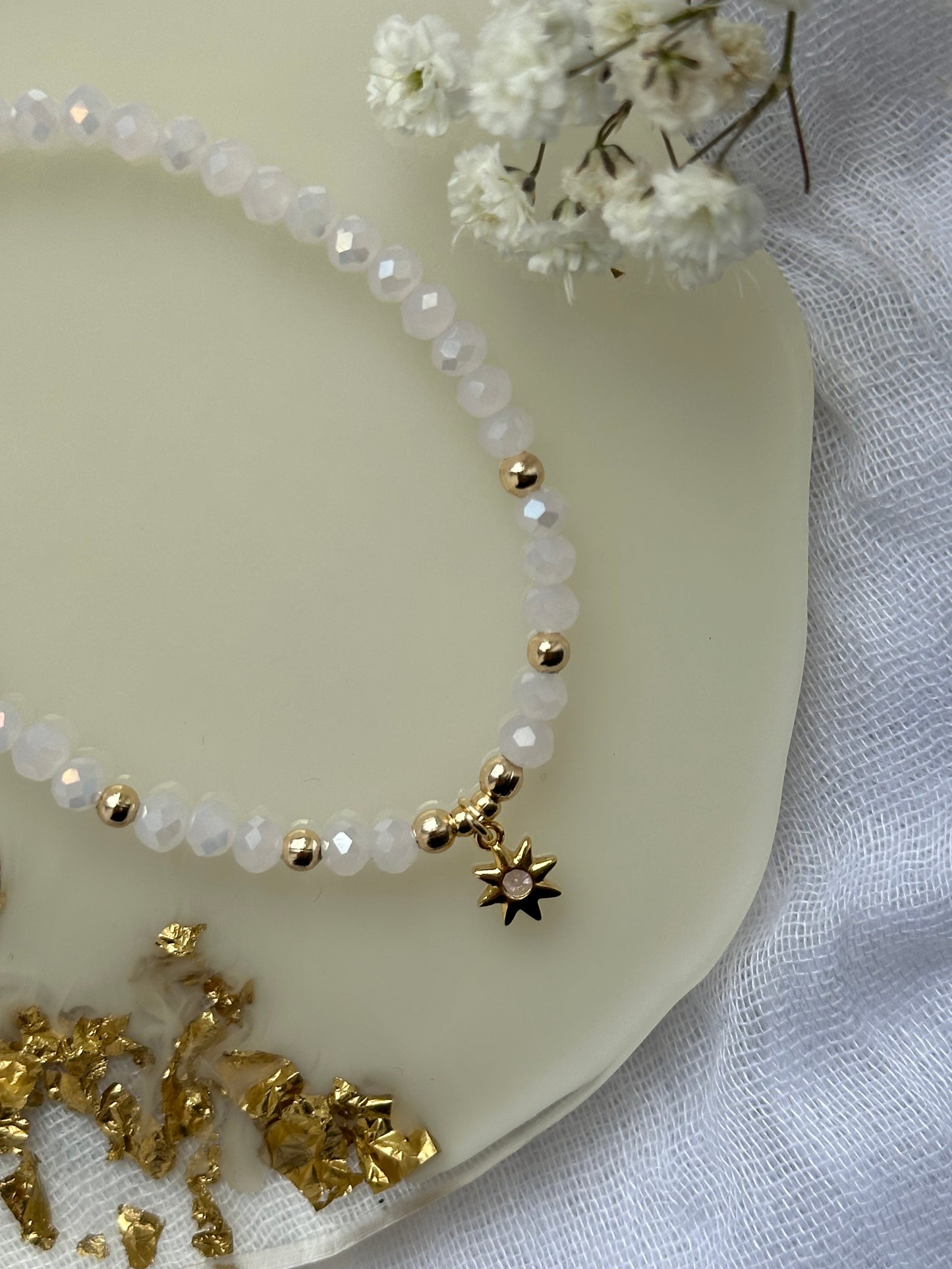 Perlenarmband mit Rosa Kristallperlen und Sonnen Anhänger - 10506