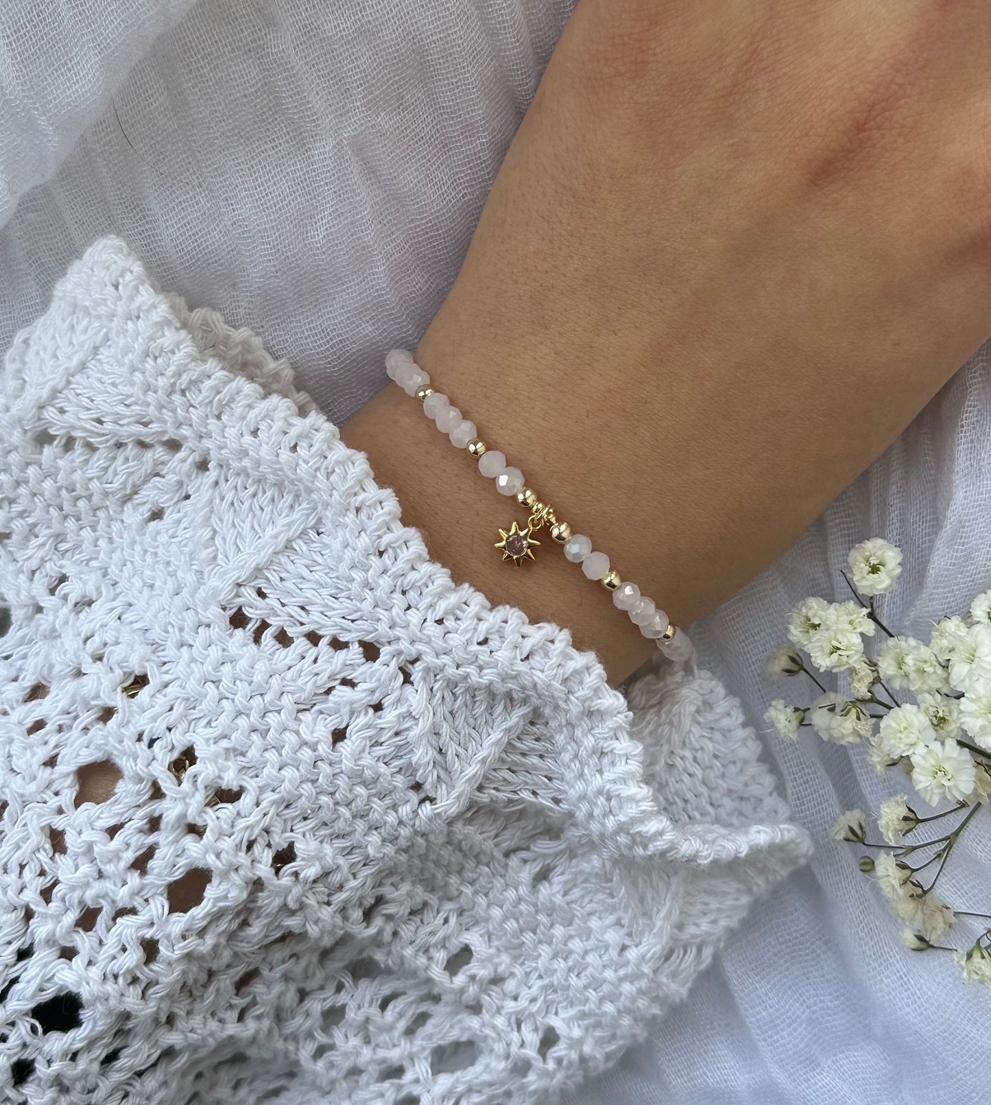 Perlenarmband mit Rosa Kristallperlen und Sonnen Anhänger - 10506