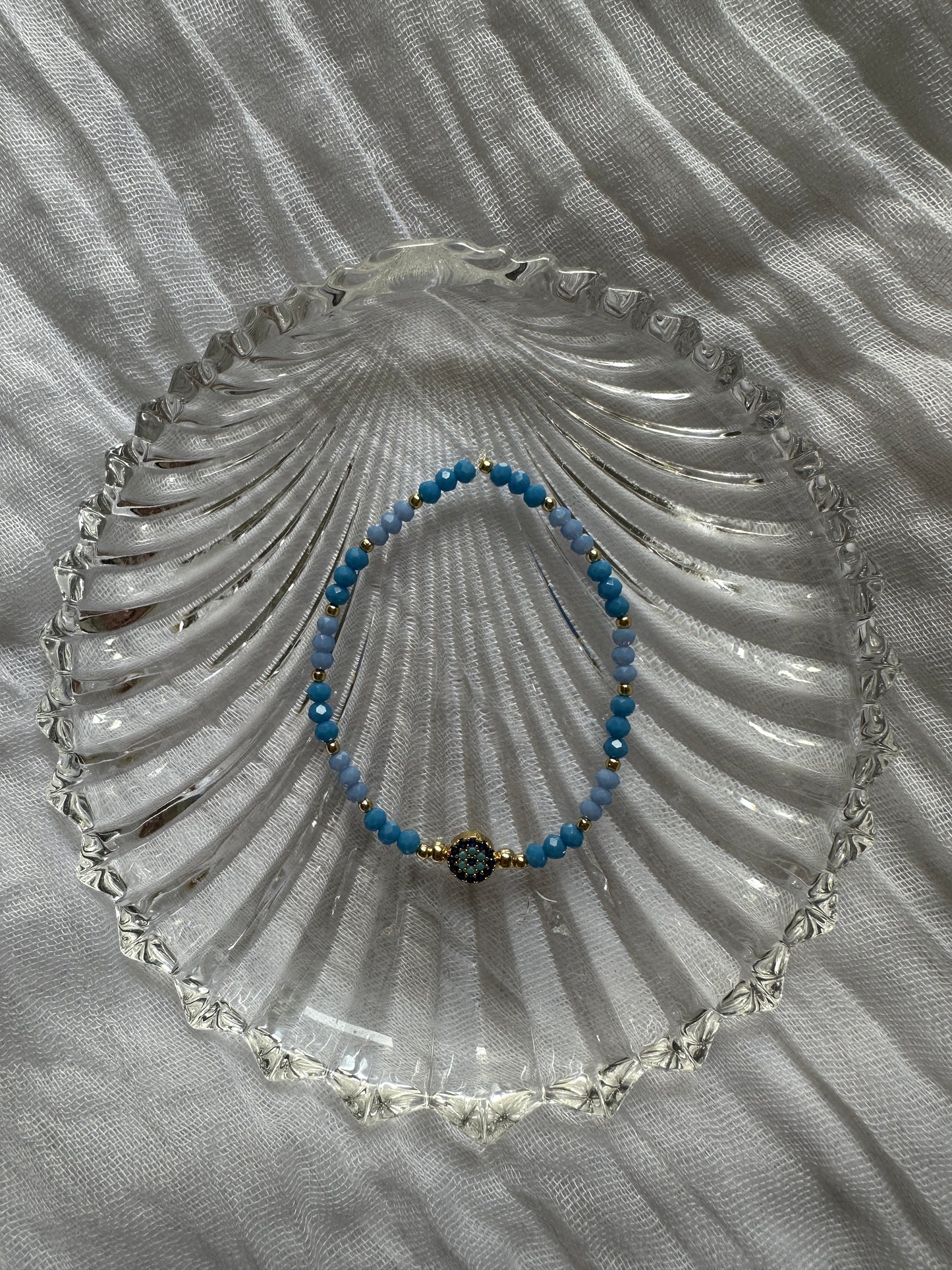 Perlenarmband mit Blauen Kristallperlen und Nazar Anhänger - 10334