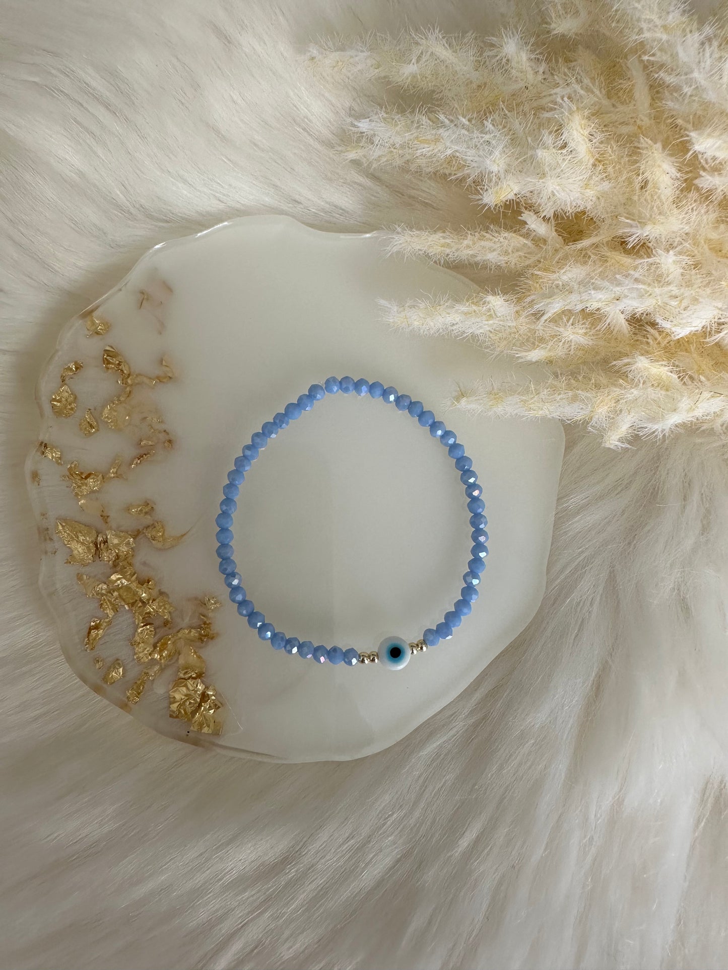 Perlenarmband mit blauen Perlen und nazar - 10296