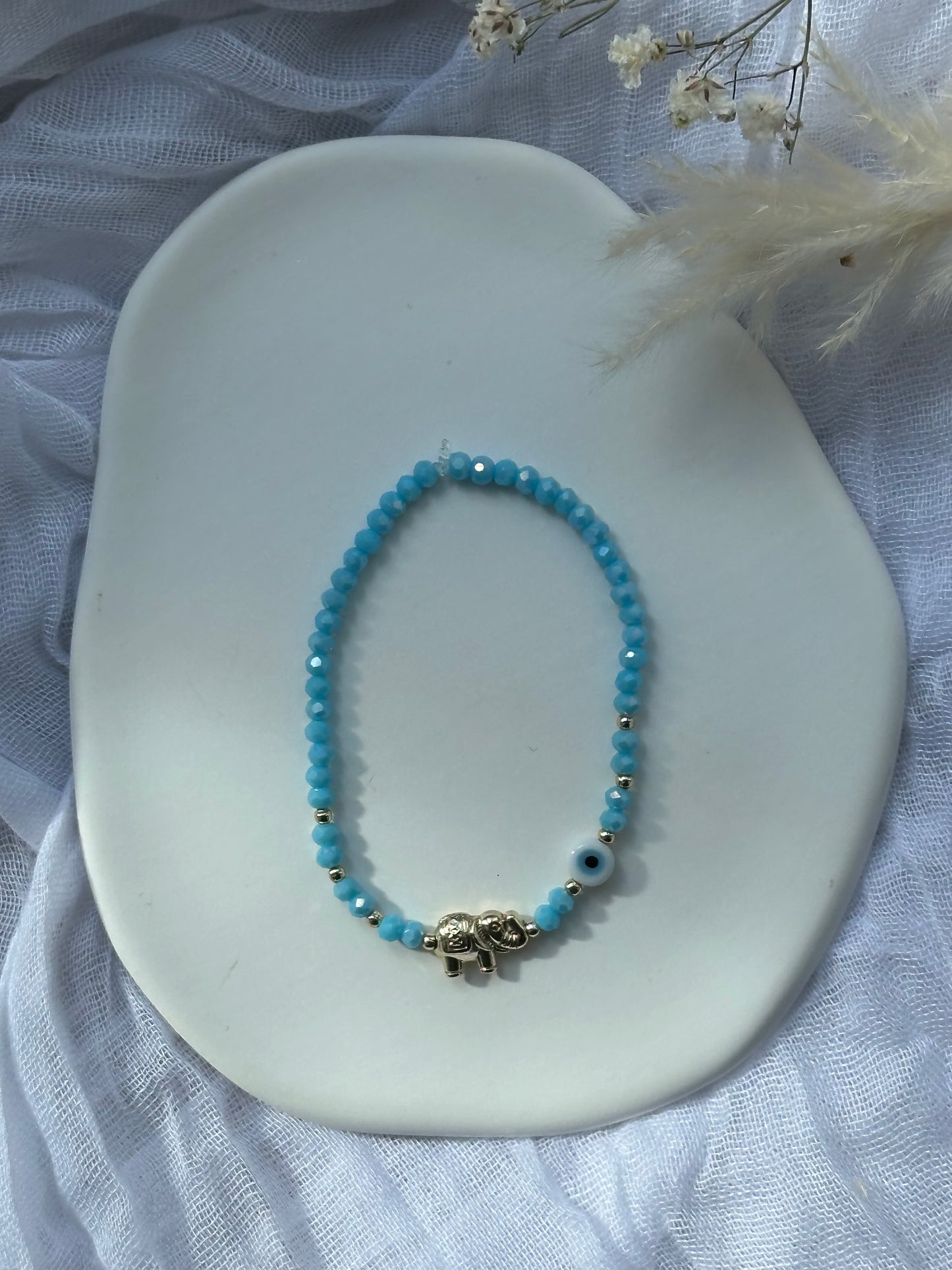 Perlenarmband mit Blauen Kristallperlen und Elefanten + Nazar Anhänger - 10671