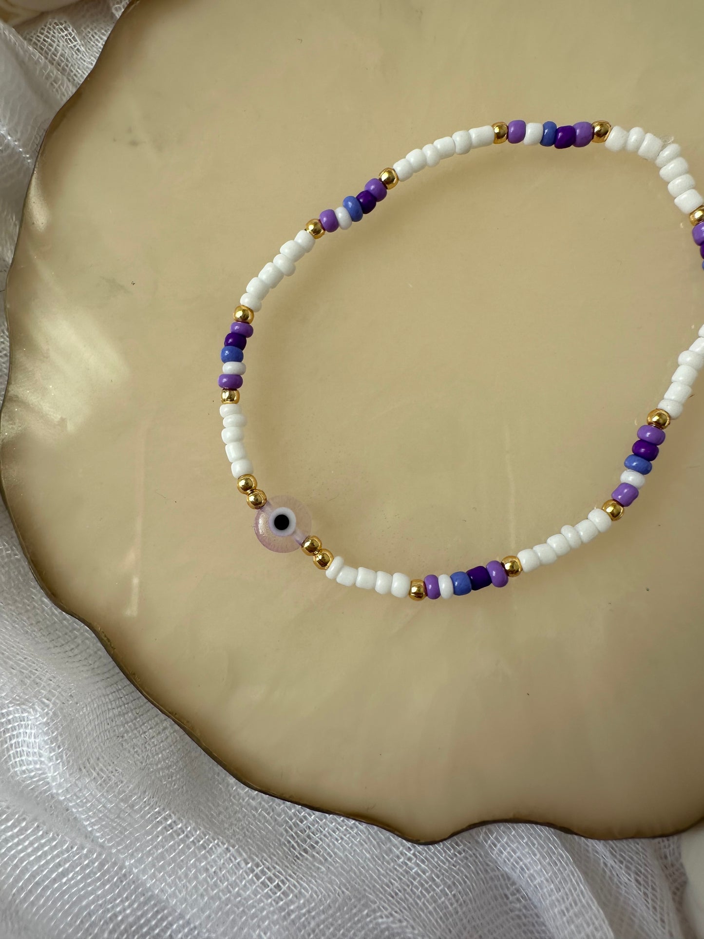 Buntes Perlenarmband mit Lila Tönen und Nazar - 10373