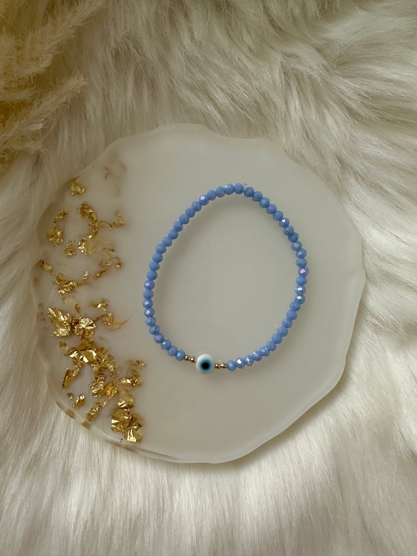 Perlenarmband mit blauen Perlen und mit nazar - 10407