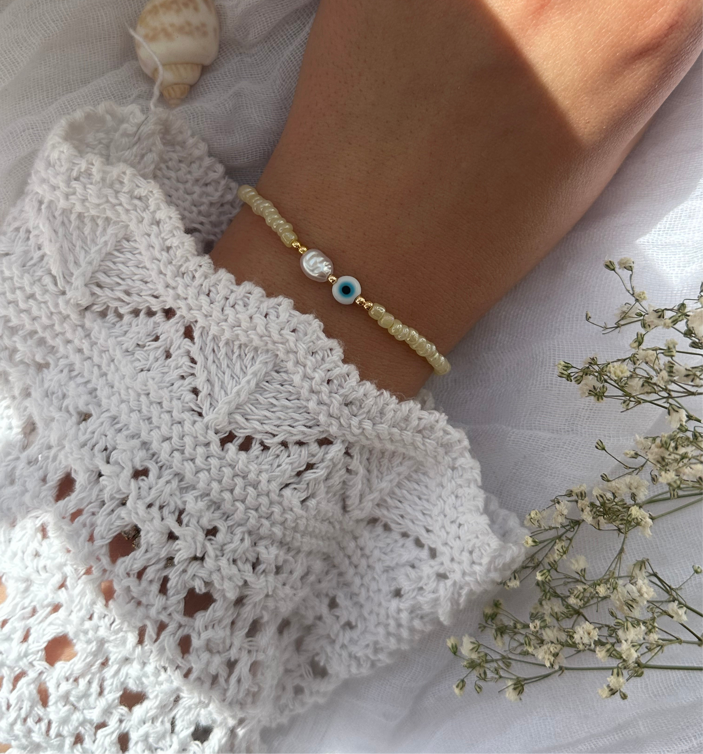 Perlenarmband mit Gelben Perlen und Goldenen Perlen + Nazar Anhänger - 10812