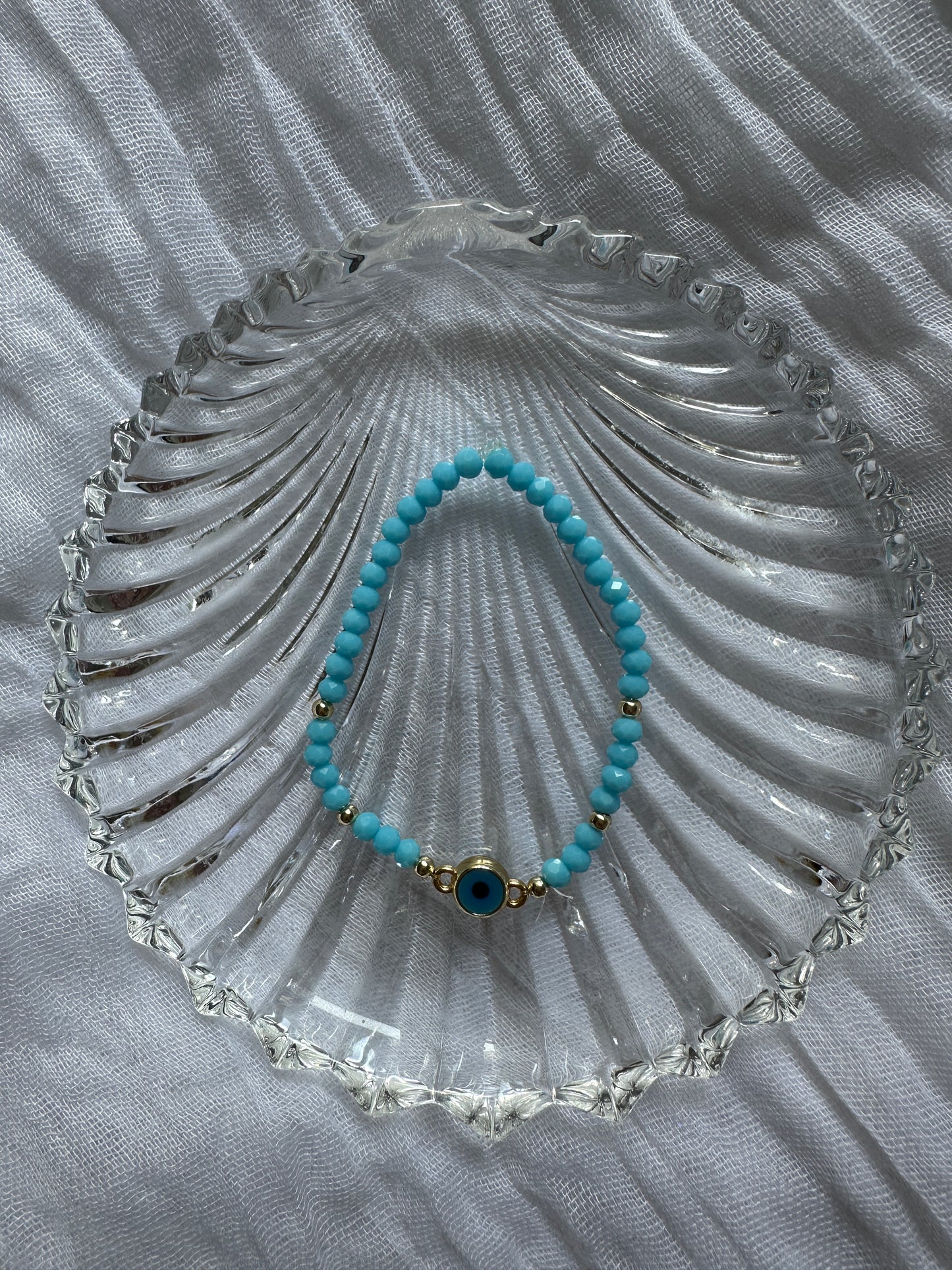 Perlenarmband mit Blauen Kristallperlen und Nazar Anhänger - 10286