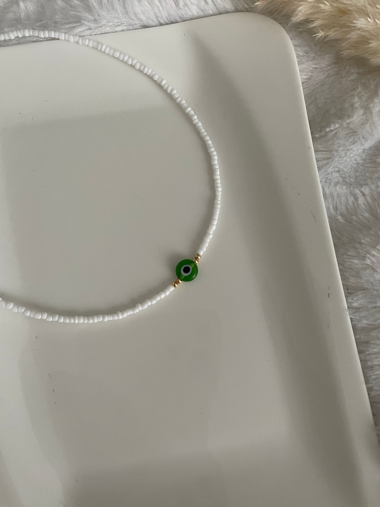 Perlenkette chocker weiß mit grünen Nazar - 10171