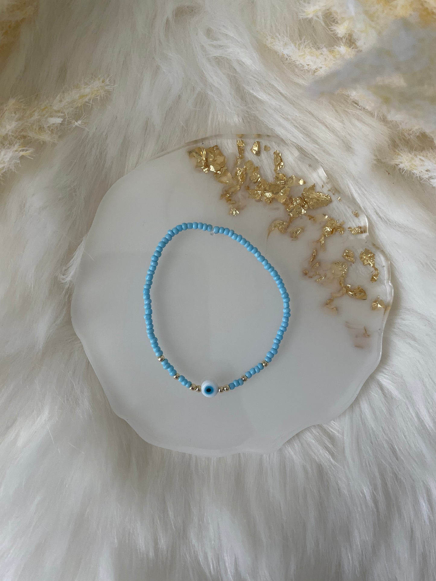 Perlenarmband mit blauen Perlen und mit Nazar - 10487