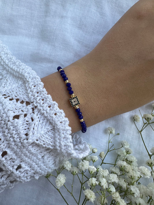 Perlenarmband mit Dunkelblauen Kristallperlen und Nazar Anhänger - 10314