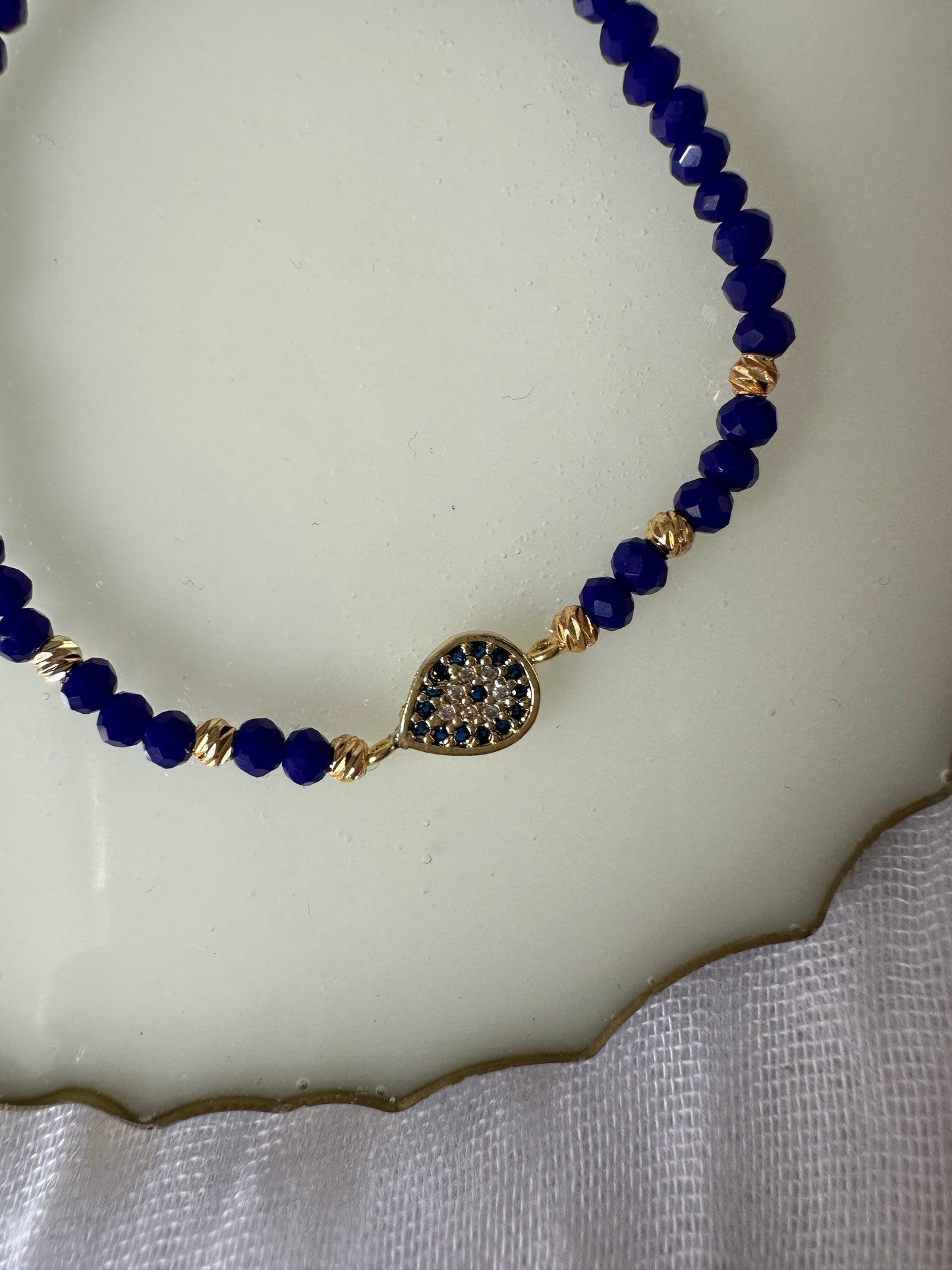 Perlenarmband mit Dunkelblauen Kristallperlen und Nazar - 10255