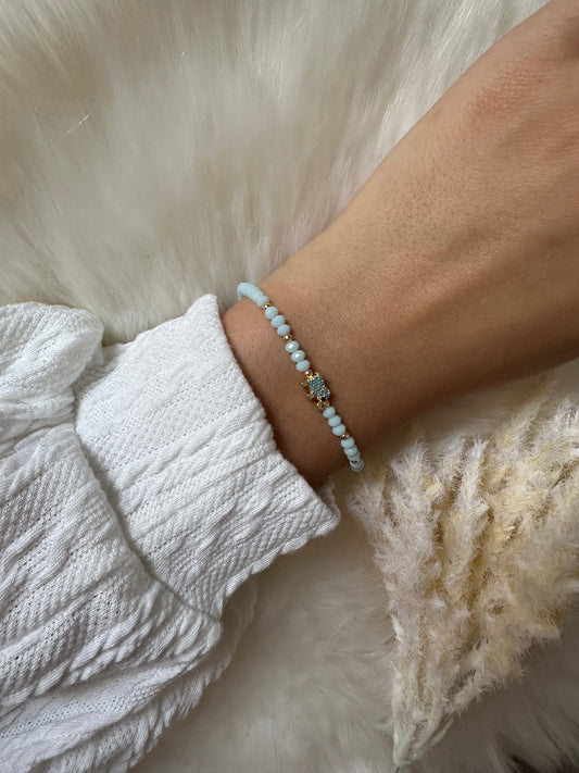 Perlenarmband mit Türkisen Kristallperlen und mit goldenem Elefanten Anhänger - 10386