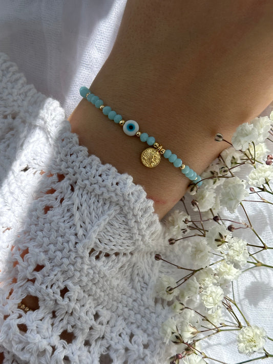 Perlenarmband mit Hellblauen Kristallperlen und goldenen Details+ Nazar und Goldener Taler  Anhänger - 10747