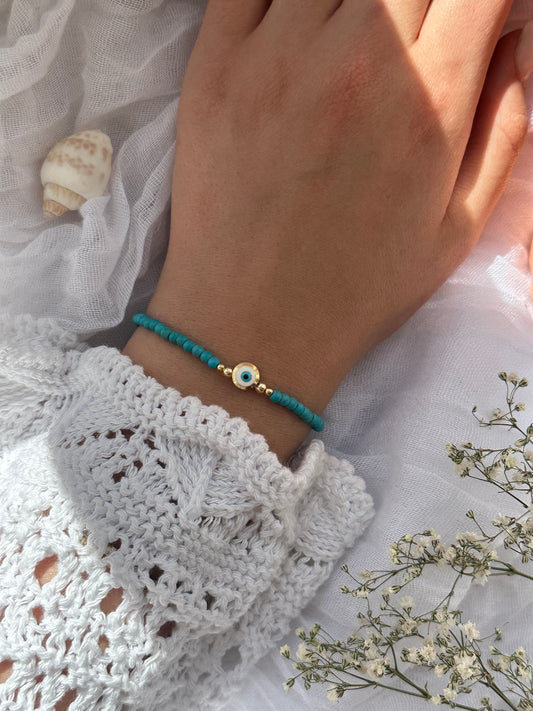 Perlenarmband mit Türkisen Perlen und Goldenen Perlen + Nazar Anhänger - 10845