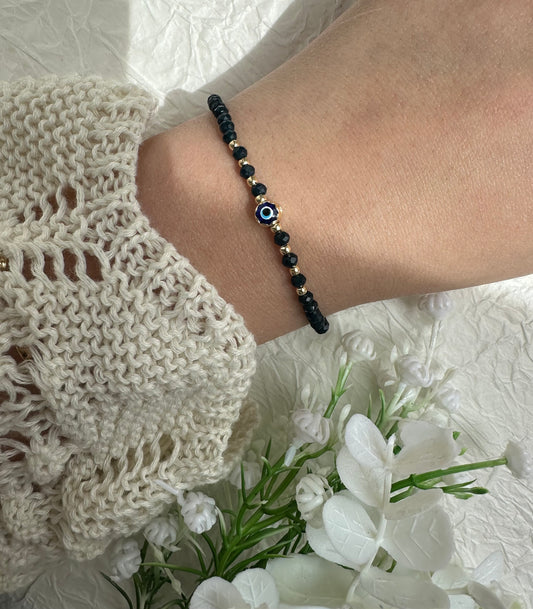 Perlenarmband mit Dunkelblauen Perlen und Nazar Anhänger - 10241