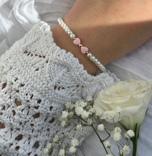 Perlenarmband mit Weißen Perlen und einer Rosa Schleife - 10538