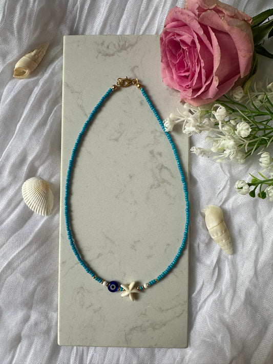 Perlenkette mit Blauen Perlen und Nazar + Seestern Anhänger - 10128