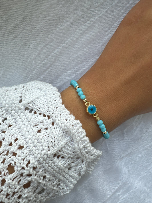 Perlenarmband mit Blauen Kristallperlen und Nazar Anhänger - 10286