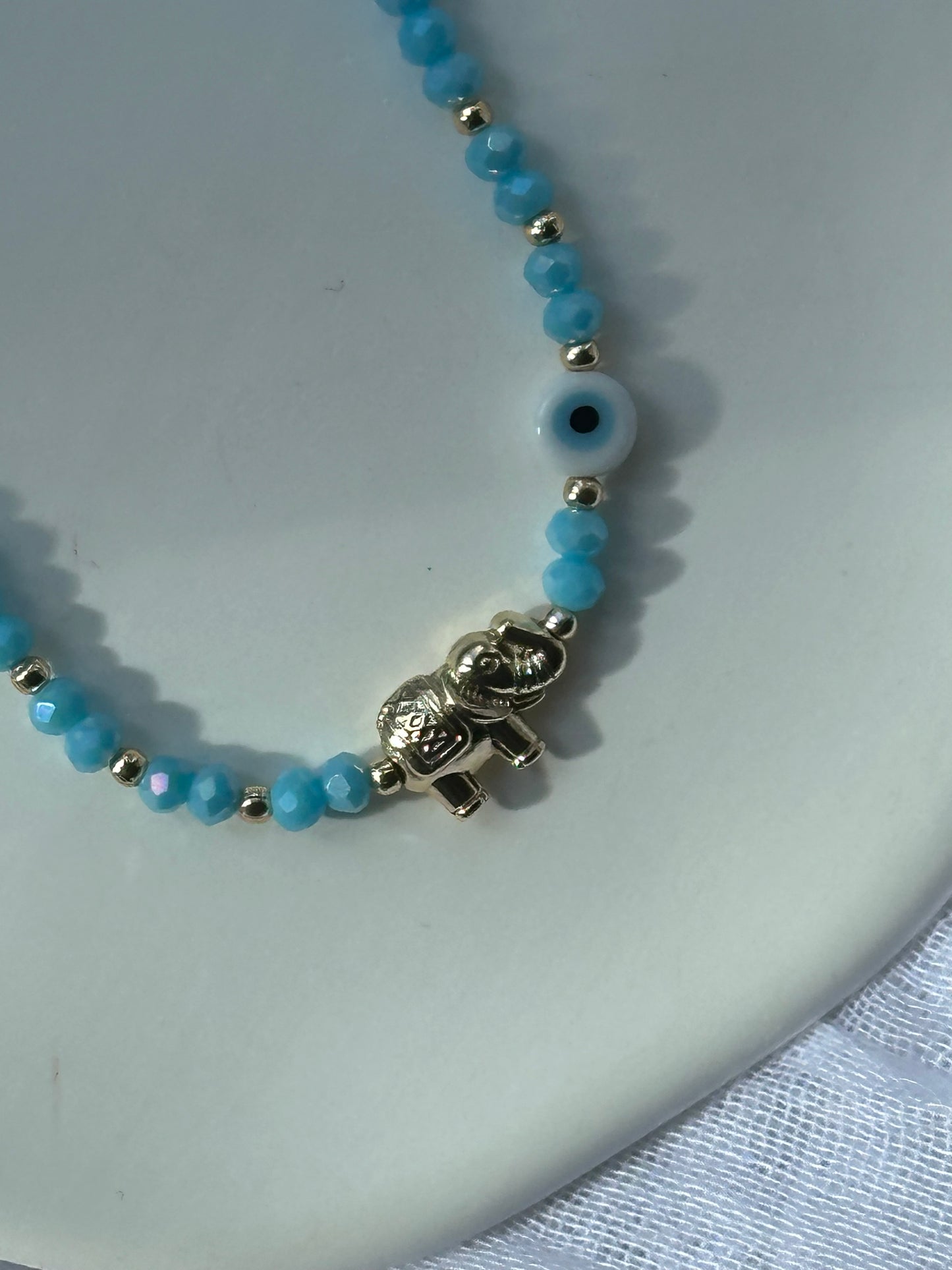 Perlenarmband mit Blauen Kristallperlen und Elefanten + Nazar Anhänger - 10671