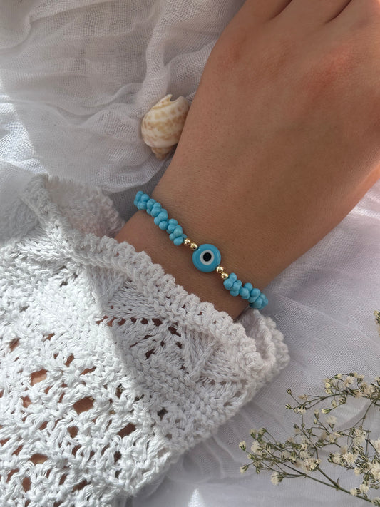 Perlenarmband mit Blauen Perlen und Goldenen Perlen + Nazar Anhänger - 10847