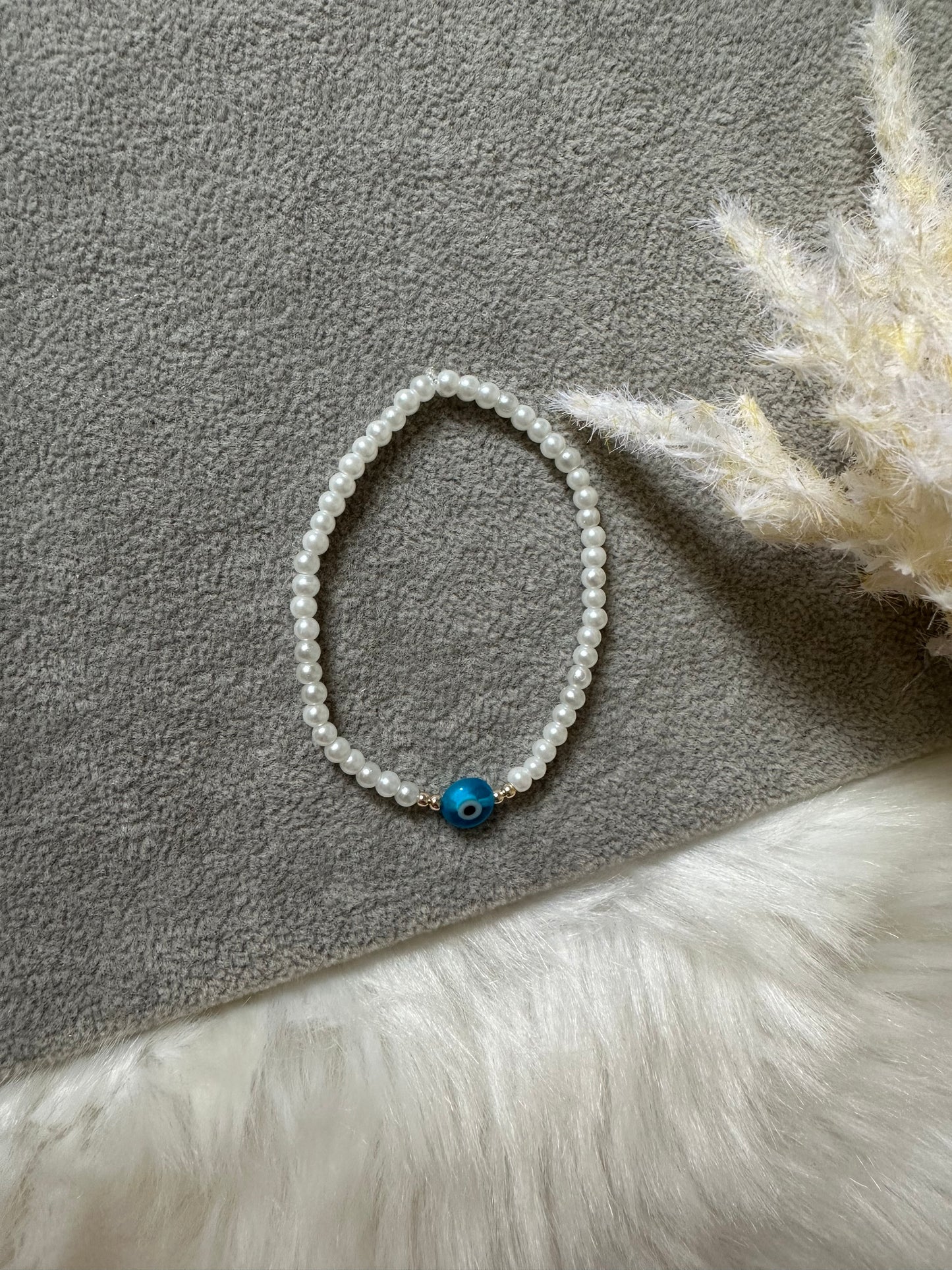 Perlenarmband weiß mit Hellblauen Nazar - 10347