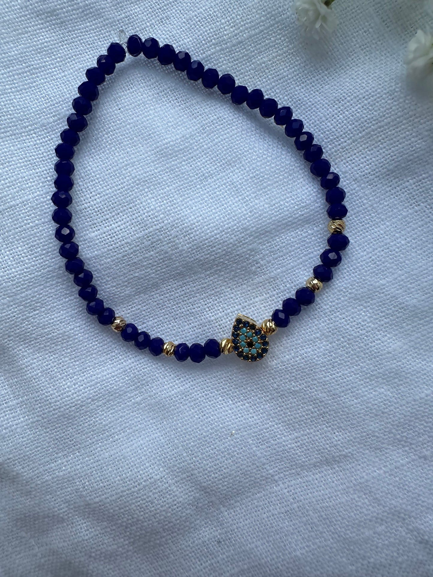 Perlenarmband mit Dunkelblauen Kristallperlen und Nazar Anhänger - 10422