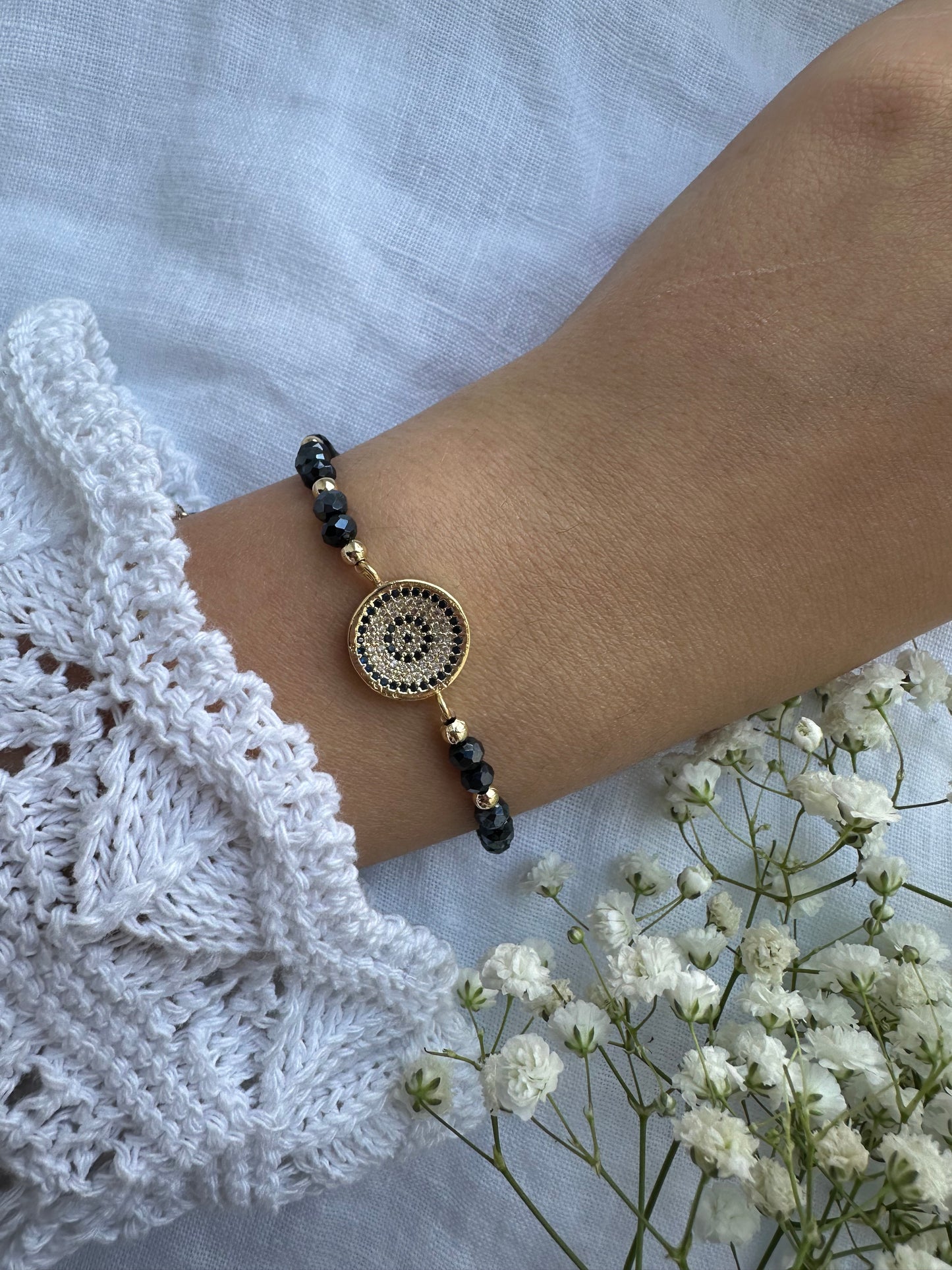 Perlenarmband mit Dunkelblauen Kristallperlen und Nazar Anhänger - 10367