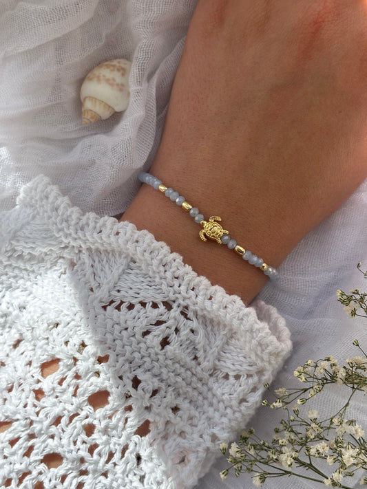 Perlenarmband mit Hellblauen Kristallperlen und Goldenen Perlen + Schildkröten Anhänger - 10838