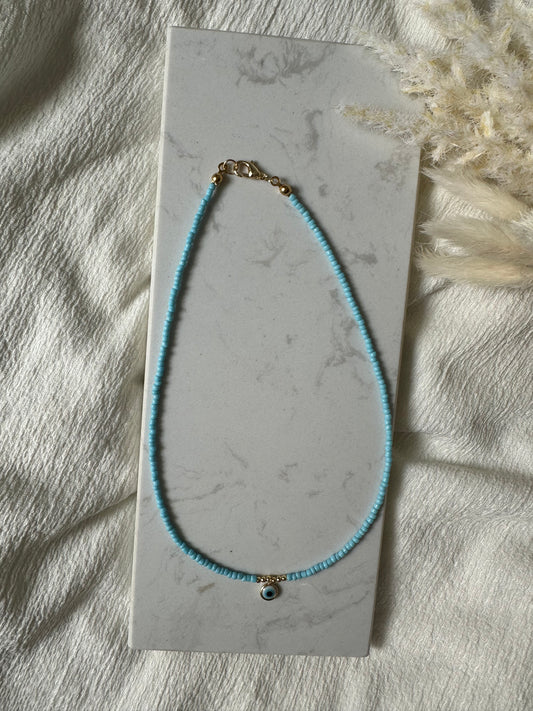 Perlenkette mit Hellblauen Perlen und Nazar - 10120