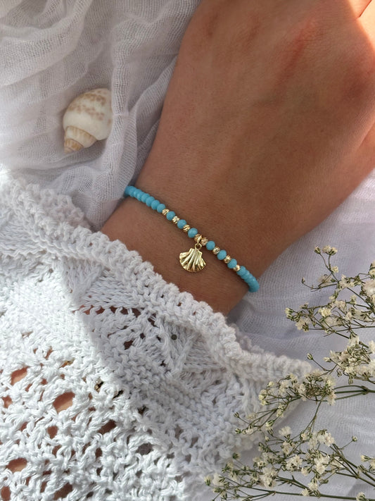 Perlenarmband mit Blauen Kristallperlen und Goldenen Perlen + Muschel Anhänger - 10840