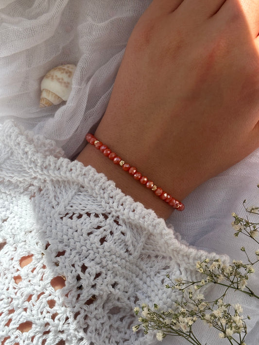 Perlenarmband mit Orangenen Kristallperlen und Goldenen Dorika Perlen - 10837