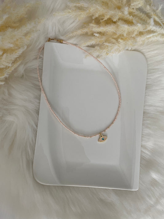 Perlenkette chocker beige mit goldenen Augen Anhänger - 10190